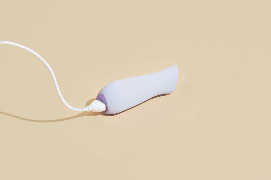Dame Kip lavender clitoral vibrator with lipstick-inspired shape