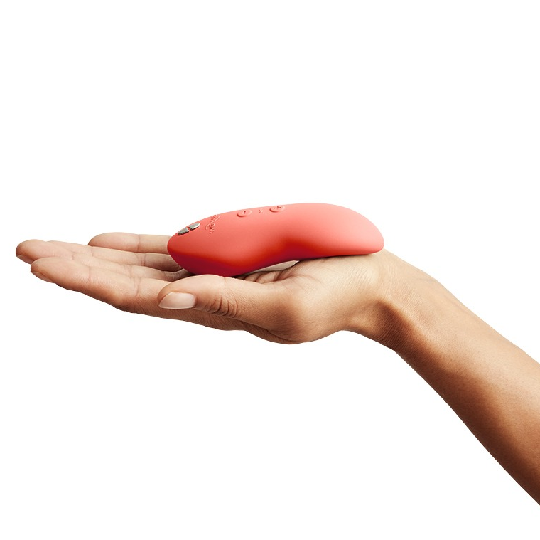 We-Vibe Touch X Vibrator in Crave Coral – soft silicone body vibrator with ergonomic design