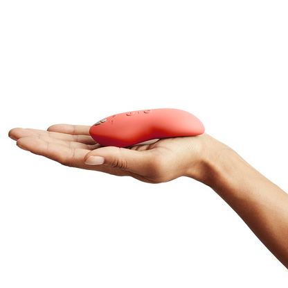 We-Vibe Touch X Vibrator in Crave Coral – soft silicone body vibrator with ergonomic design
