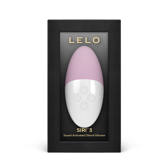 A pink and white vibrator named 'Lelo Siri 3' in its packaging, with a button-like control panel on the front. The packaging is black with the brand name 'LELO' prominently displayed.