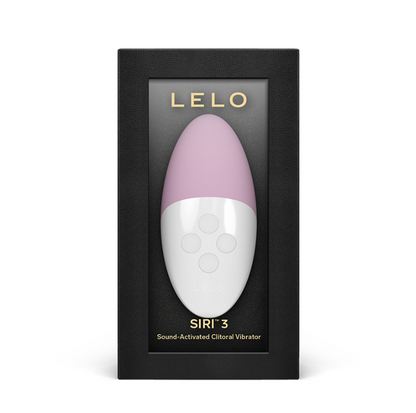 A pink and white vibrator named 'Lelo Siri 3' in its packaging, with a button-like control panel on the front. The packaging is black with the brand name 'LELO' prominently displayed.