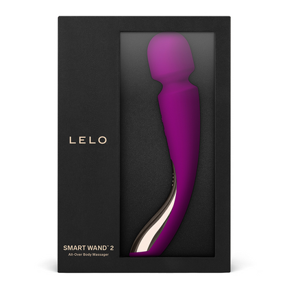 A rose-colored, sleek massager wand with a smooth surface, displayed in its packaging which reads 'LELO' and 'SMART WAND 2'. The packaging is black with a subtle shine.