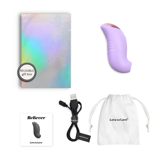 A small, ergonomically designed clitoral stimulator in blush pink, featuring a flapping silicone membrane and LED-lit button.
