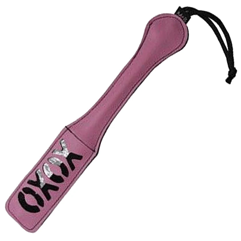 Sportsheets XOXO Paddle in pink vegan leather with cheeky imprint