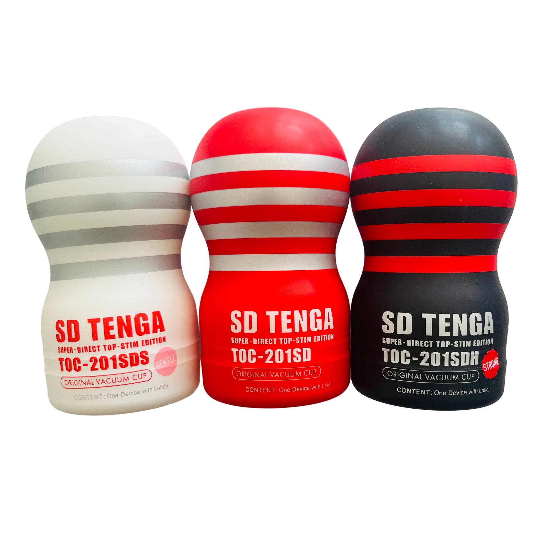 Three Tenga Original Vacuum Cups in white with red and black stripes, and one in black with red stripes, displayed side by side.