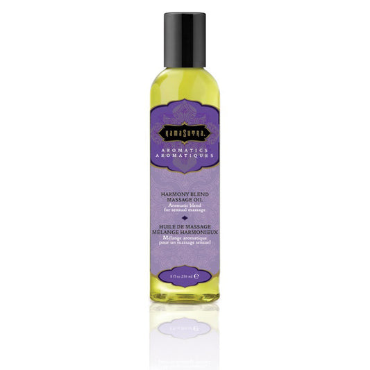 Bottle of Kama Sutra Aromatic Massage Oil with 'Harmony Blend' label, 8 oz size.