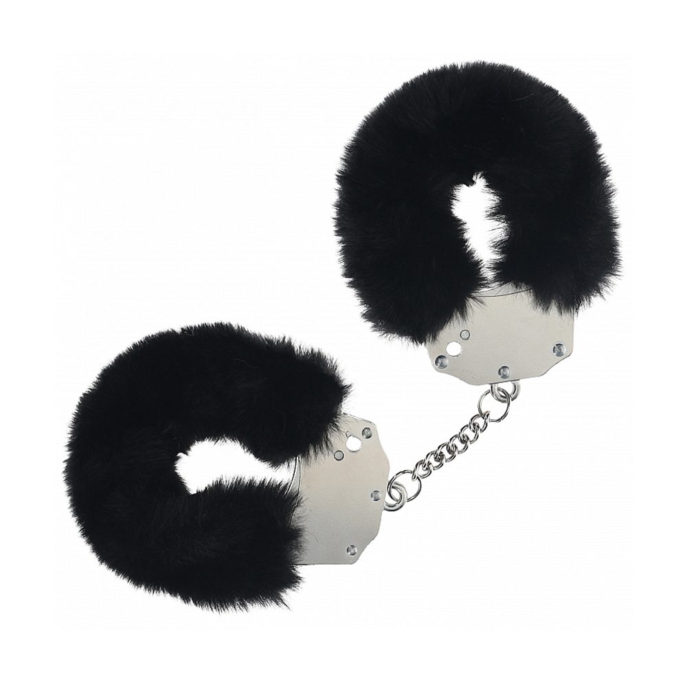 Black fur handcuffs on a white background