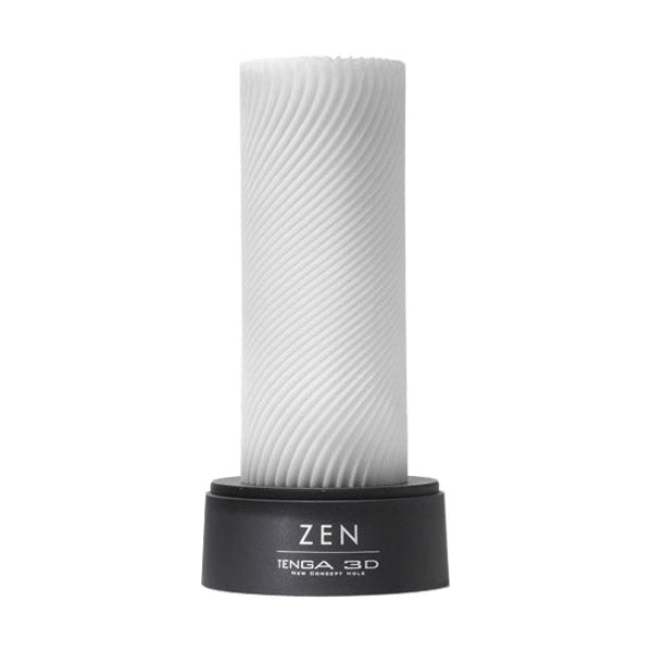 The image shows a white male masturbator with a textured surface, labeled 'Tenga 3D' and 'Zen'. It is mounted on a black stand with the brand name visible.