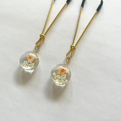 Gold nipple clamps with globe resin charm containing dried flowers – PurpleNight.ca