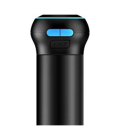 A black Kiiroo Control device with a blue accent on the top button. The device appears to be sleek and modern, with a small display and buttons for navigation.