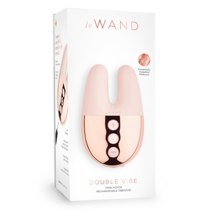 Dual-motor mini vibrator with textured silicone sleeve