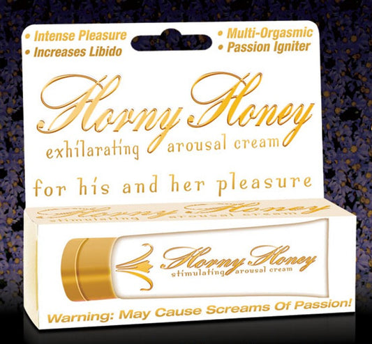 The image displays the packaging of "Hott Horny Honey Stimulating Gel." The packaging is sleek and compact, featuring a white and gold color scheme that gives it an elegant yet seductive look.