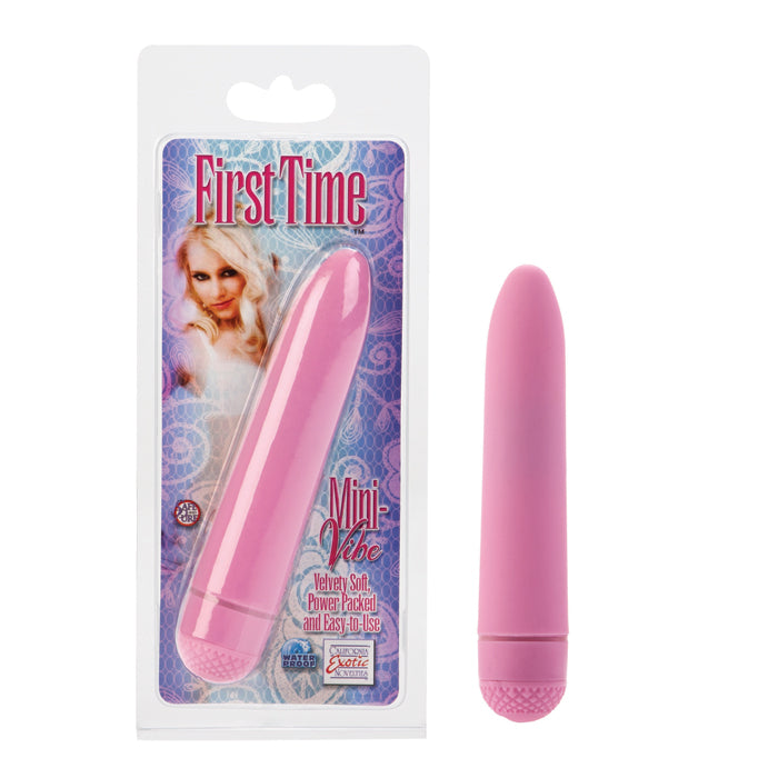 Pink mini vibrator with packaging featuring a woman's face on a white background