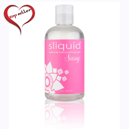 Bottle of Sliquid Naturals Sassy Natural Lube with a pink label and flower design.