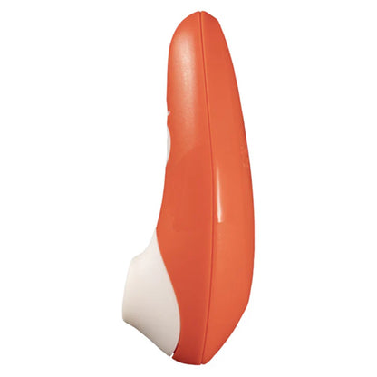 ROMP Switch Clitoral Stimulator in orange with silicone suction head