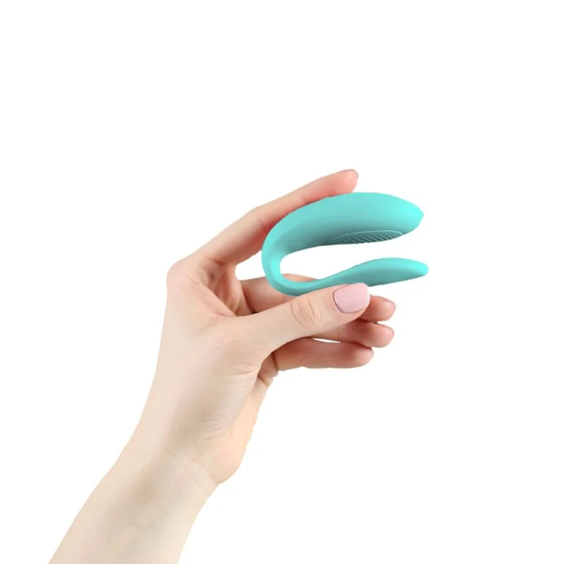 Ergonomic and quiet Sync Lite couples toy worn during sex